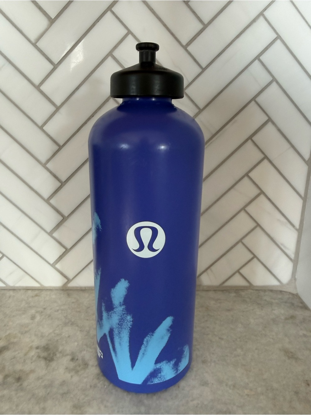 Lululemon / Sigg Stainless Steel Waterbottle - purple/blue with white logo.